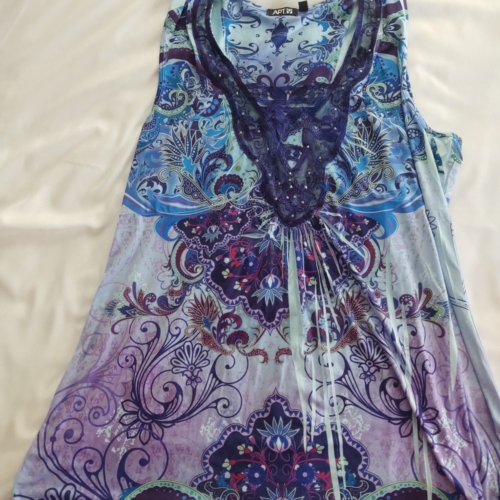 Two woman's sleeveless Sublimation tops
